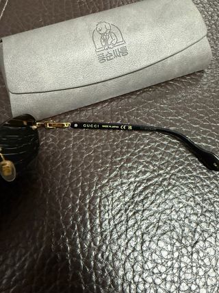 Gafas de Sol Gucci Doradas y Negras