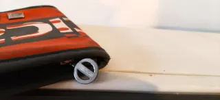 Cartera Radical Negra y Naranja.