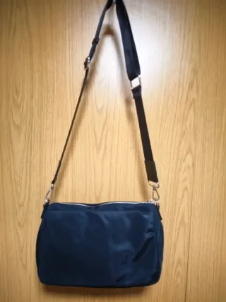Bandolera negra multi bolsillos – cómoda nylon