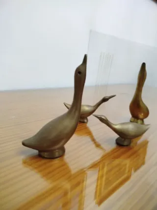 Patos de bronce decorativos