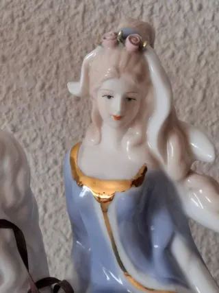 Figura porcelana mujer a caballo