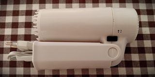 Secador de pelo compacto plegable