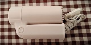 Secador de pelo compacto plegable