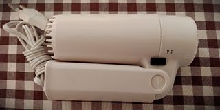 Secador de pelo compacto plegable