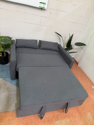 Sofá cama gris de tela