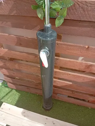 Ducha exterior con depósito,platos y según se ve