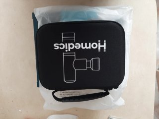 Pistola de masaje