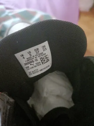 Zapatillas Puma niño altas negras y blancas