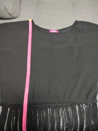 blusa transparente con flecos