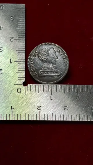 Botón Alfonso XII