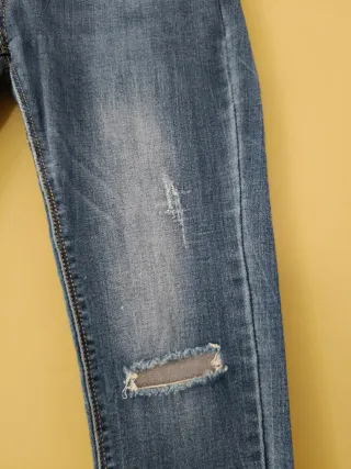 Jeans donna strappi ginocchio taglia 44