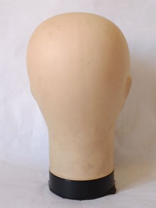 Cabeza de maniquí de plástico beige