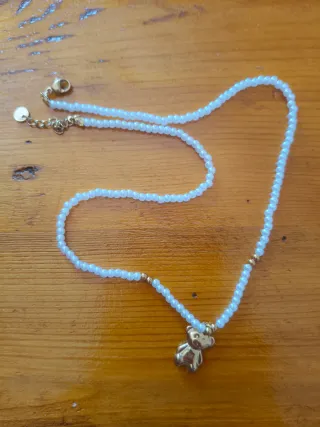 Collana perle bianche con orsetto dorato