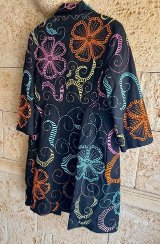 Gabardina Niza y vestido a estrenar