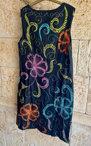 Gabardina Niza y vestido a estrenar