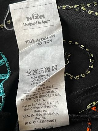 Gabardina Niza y vestido a estrenar