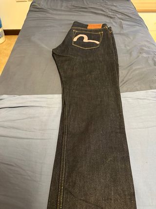 Jeans Evisu con logo rosa