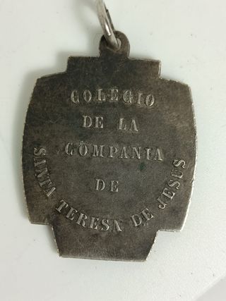 Antigua medalla premio Colegio S. Teresa