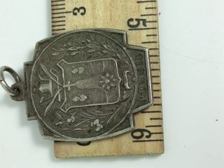 Antigua medalla premio Colegio S. Teresa
