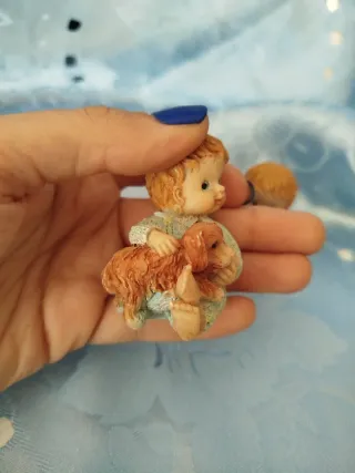 Statuine vintage bambini con cagnolini