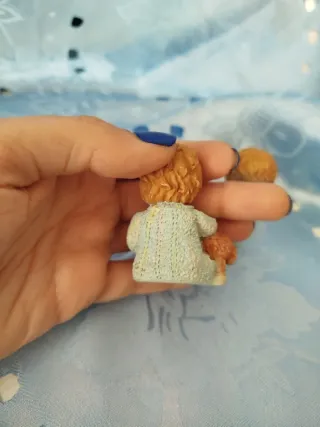 Statuine vintage bambini con cagnolini