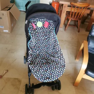 Carrito de bebé a rayas marca  peg-pérego + funda