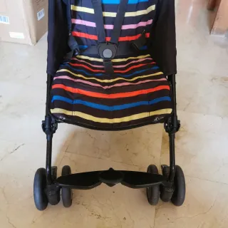 Carrito de bebé a rayas marca  peg-pérego + funda