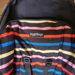 Carrito de bebé a rayas marca  peg-pérego + funda