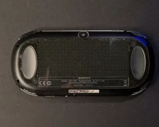 PSVita + Caricatore + SD + Accessori