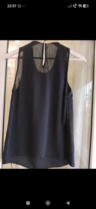 Camisa sin manga con flecos