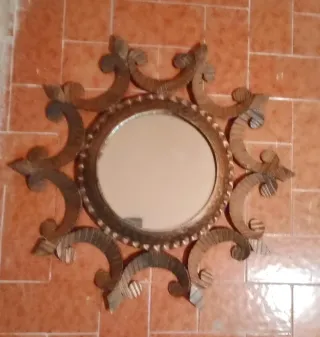 Espejo decorativo de bronce