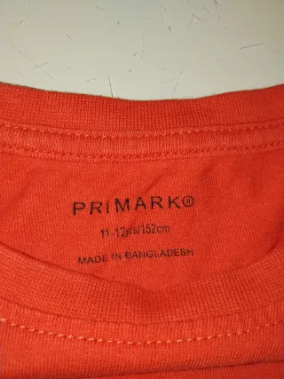 Camiseta Rebel by Primark rosa 11-12 años y Polito