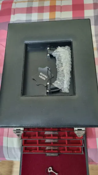 Maletín para monedas con bandejas