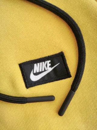 Chándal Nike con capucha y cremallera amarillo