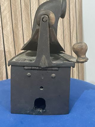 Plancha antigua de hierro fundido