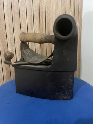 Plancha antigua de hierro fundido