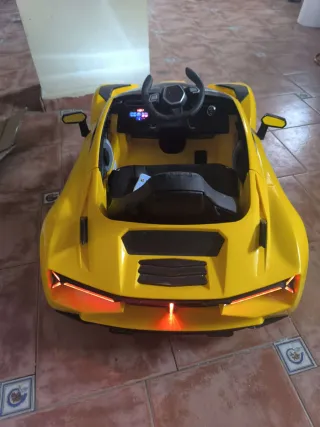 Coche eléctrico lamborghini infantil amarillo