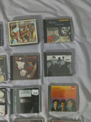 Lote 16 CDs (Bach, U2, Nirvana, Miles, Ella, Billi