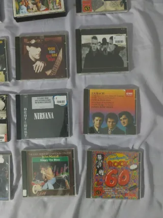 Lote 16 CDs (Bach, U2, Nirvana, Miles, Ella, Billi