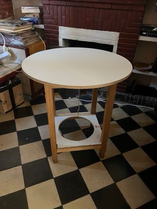 Mesa redonda blanca patas madera