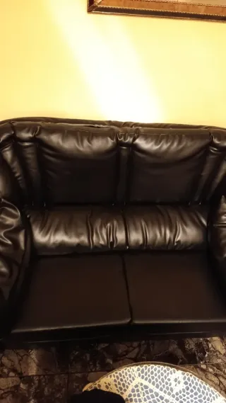 Conjunto de sofás de piel negros
