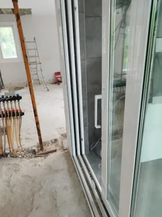 Corredera elevable triple cristal