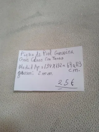 Piel genuina gris claro con forro 25€.