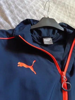 Chaqueta deportiva Puma azul y naranja