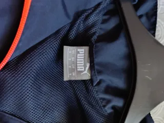 Chaqueta deportiva Puma azul y naranja