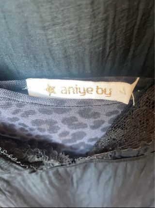 Abito donna nero con sottoveste maculata