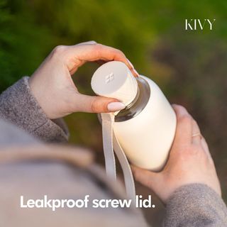 Botella de agua cristal con funda silicona