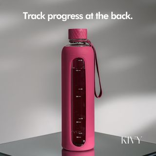 Botella de agua cristal con funda silicona