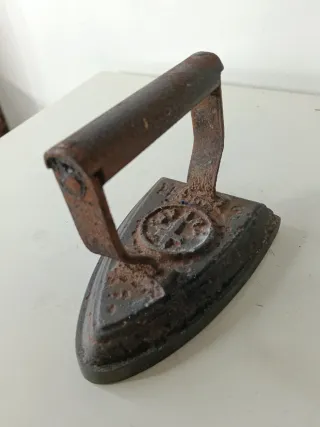 Plancha antigua de hierro