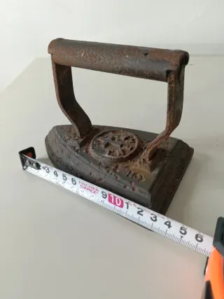 Plancha antigua de hierro